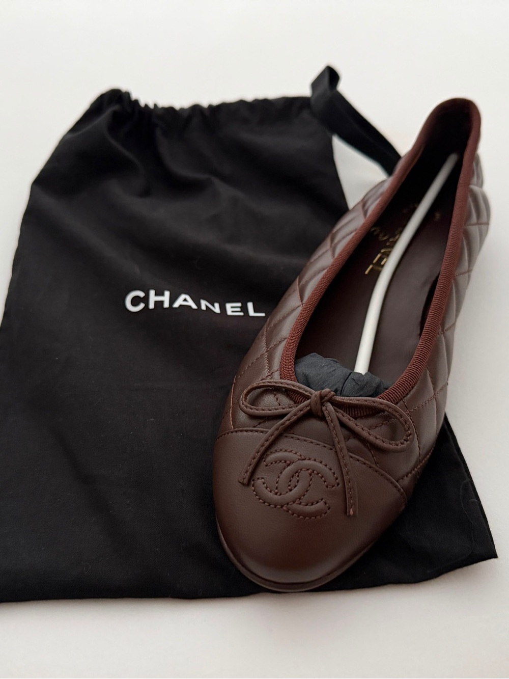 CHANEL Brown Leather Cap-Toe Bow Ballet Flats